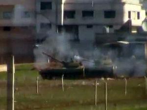 叙利亚霍姆斯市日前遭炮击230人死亡。(图:网易)