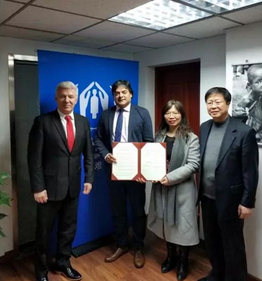 爱德基金会与联合国难民署在京签署合作备忘录。(图:爱德基金会官网)